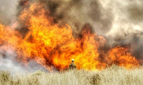 A firefighter responds to a wildfire in Oregon