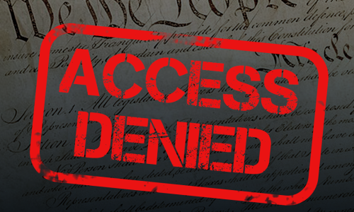 an "access denied" stamp in red covering the text of the Constitution
